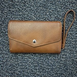 Brown Mundi 5 x 7 wristlet. Many card slots and zippered closure. Checkbook area